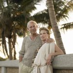 Middle age couple outside on tropcial beach