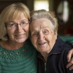 Older woman with her elderly mother