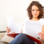 woman filling out paperwork hysterectomy